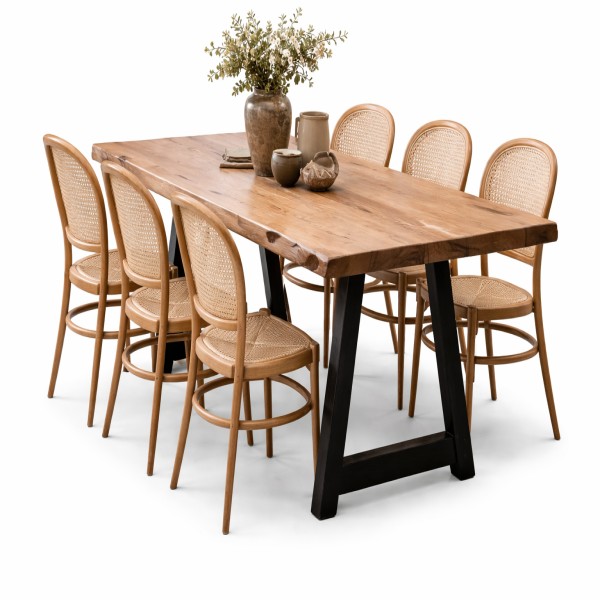 Rustic dining table with rattan chairs